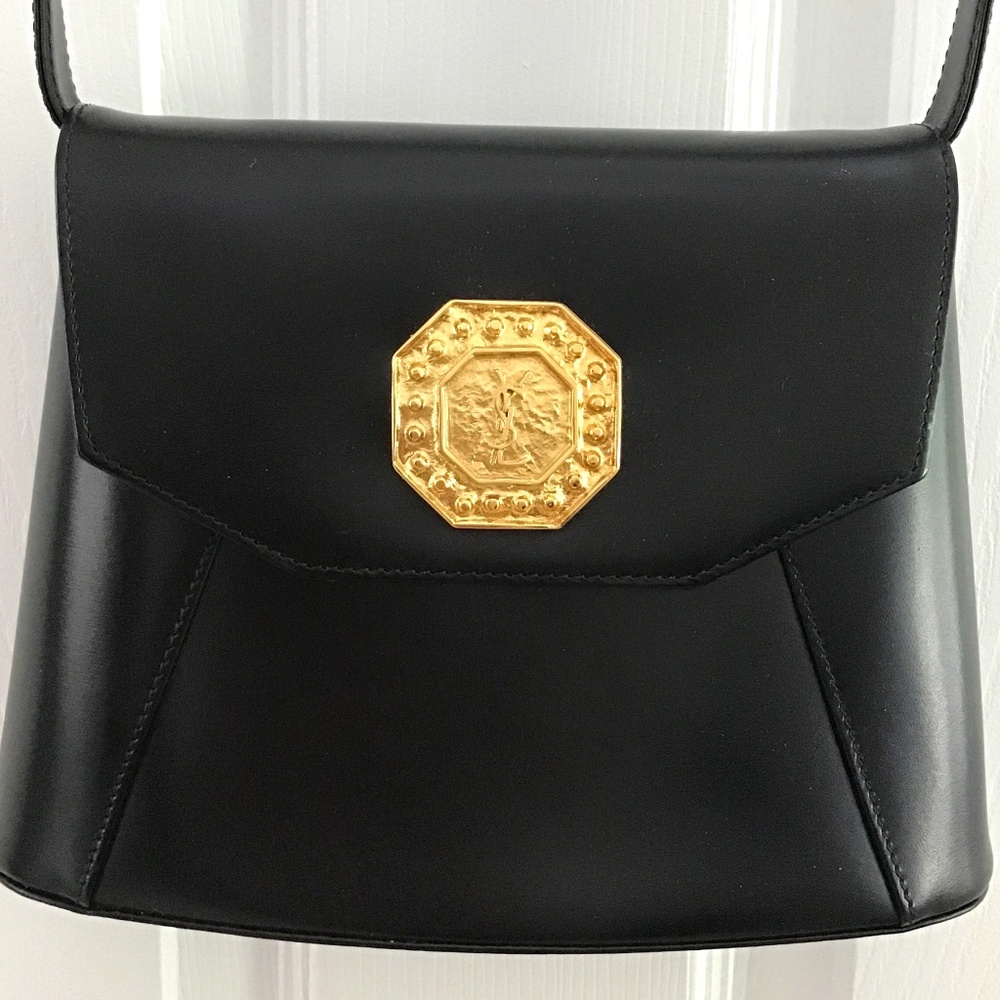 YSL Black Leather Handbag with YSL gold tone logo in the front